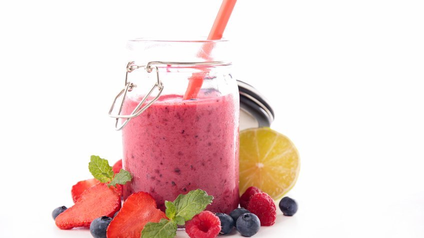 berry fruit smoothie on white background